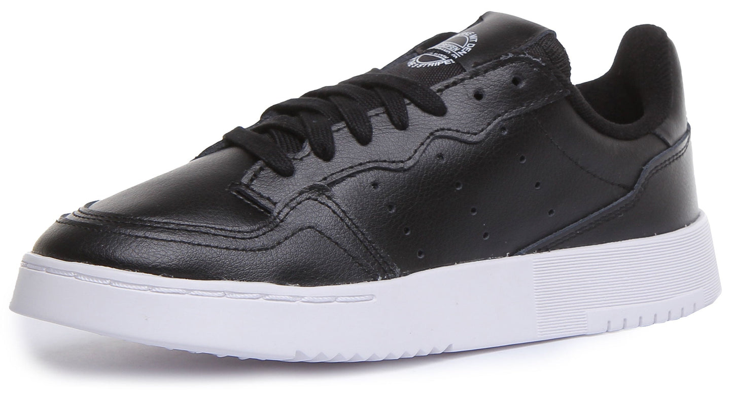 Adidas Supercourt J Chaussures de sport en cuir à lacets pour jeunes en noir et blanc