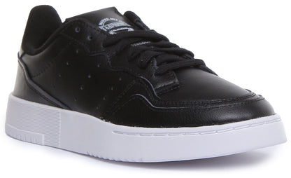 Adidas Supercourt J Chaussures de sport en cuir à lacets pour jeunes en noir et blanc