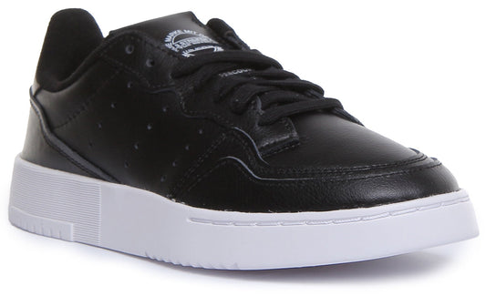 Adidas Supercourt J Chaussures de sport en cuir à lacets pour jeunes en noir et blanc